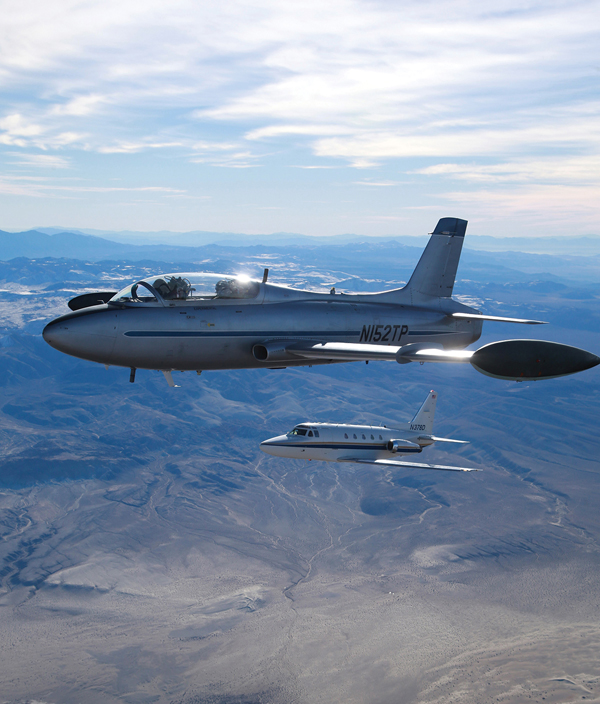 Two planes flying over Mojave Desert