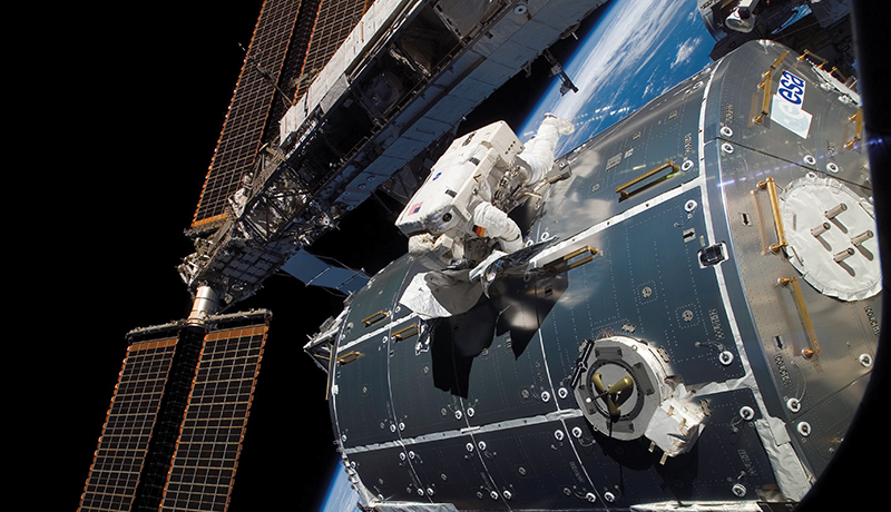 Astronaut working on the outside of the International Space Station