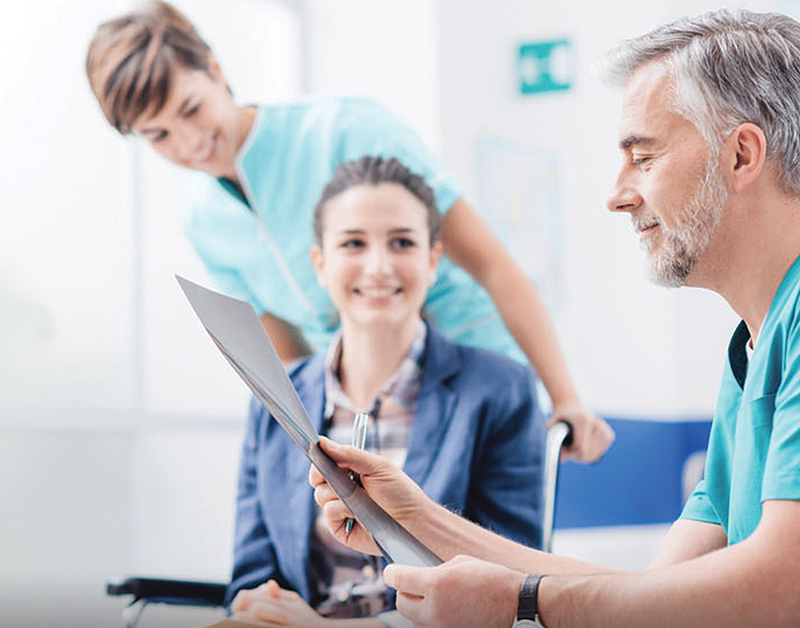 Doctor and nurse with patient