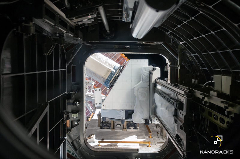 view of the NanoRacks External Payload Platform from inside the International Space Station