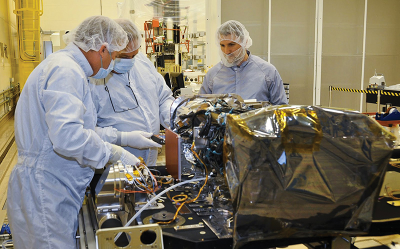 Engineers working on the Geostationary Operational Environmental Satellite-R