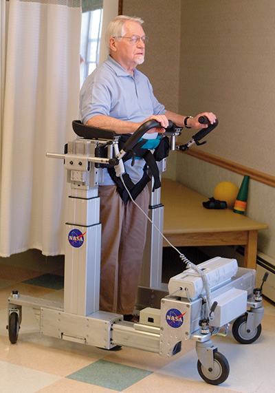 Man using wheeled walker