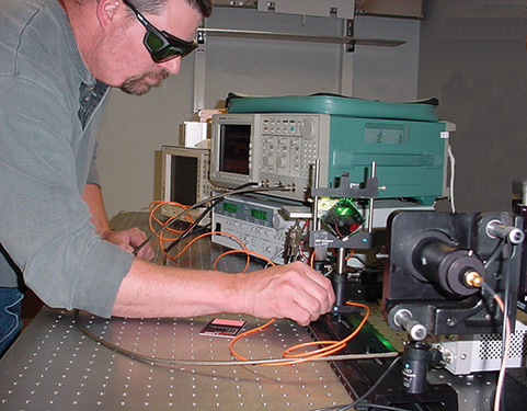 An engineer works with a machine that measures air data