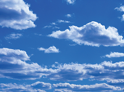 A bright blue cloud filled sky to demonstrate water vapor in the air