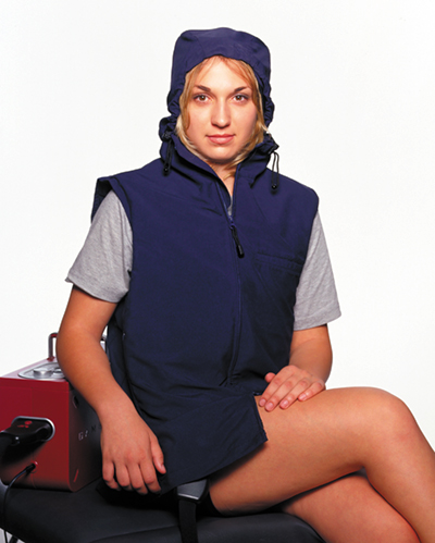 Woman wearing the Recharge™ Active Cooling System vest 