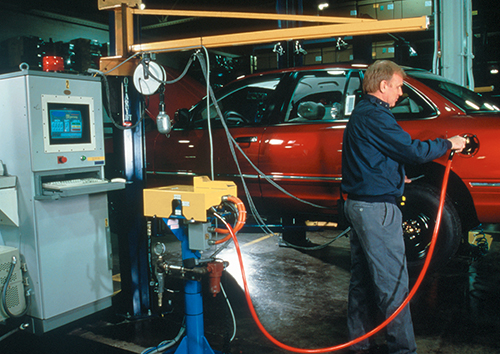 A natural gas-powered car is being checked for hydrogen leaks