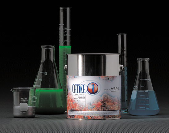 A labeled container of Catize, situated among beakers filled with other substances