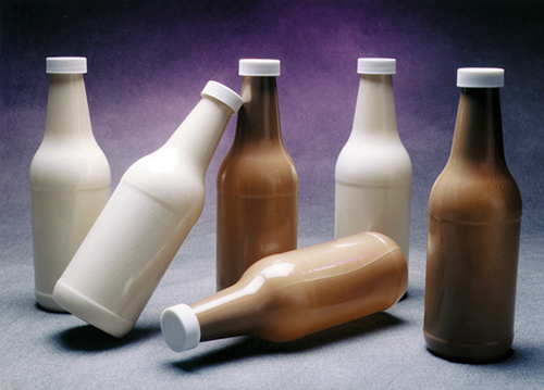 Various bottles, standing and on their sides, created from liquid polymers