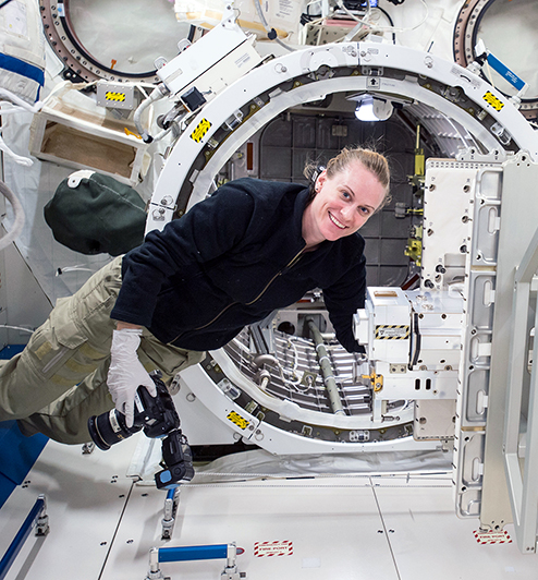 Astronaut Kate Rubins in front of the Japanese Experiment Module Airlock