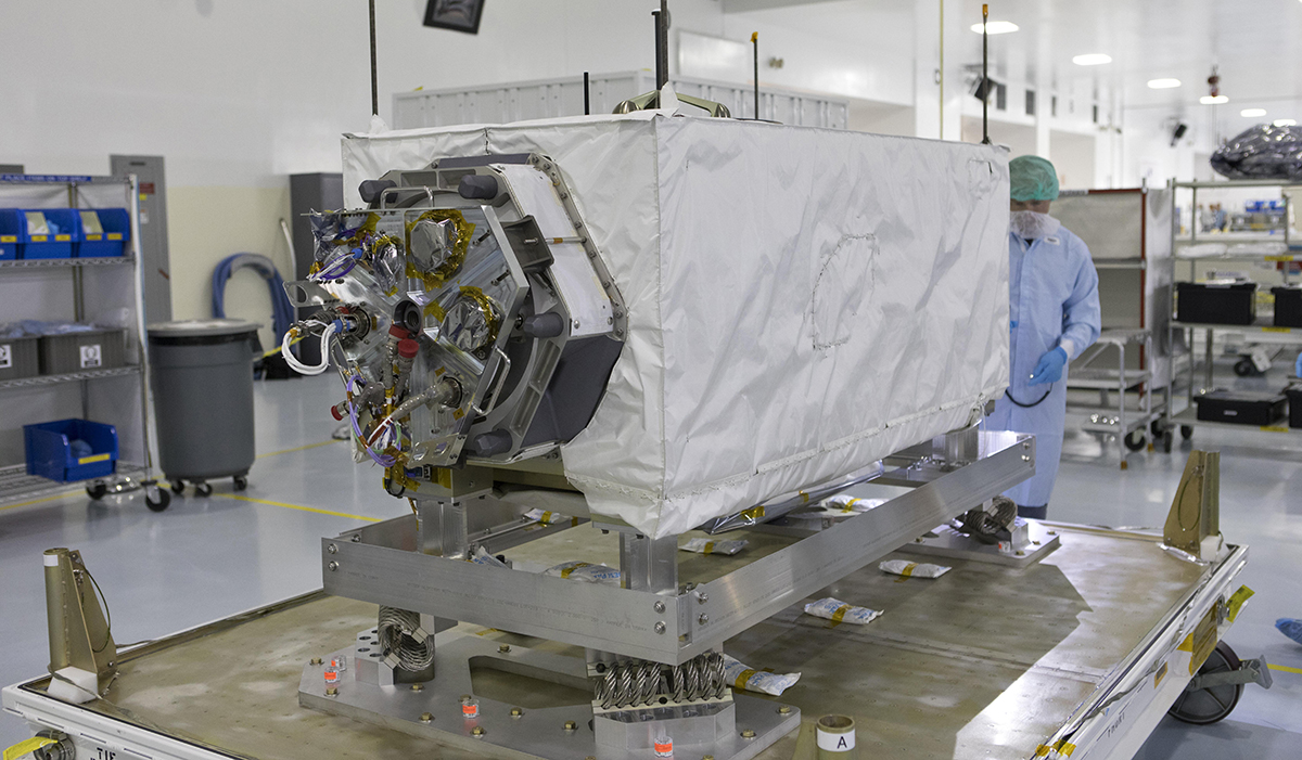 The Ecosystem Spaceborne Thermal Radiometer Experiment (ECOSTRESS), seen here undergoing inspection at Kennedy Space Center prior to launch