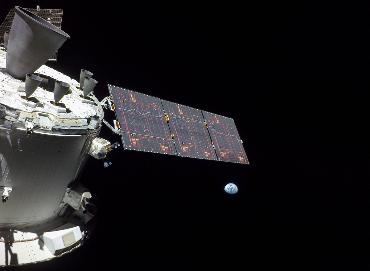 Earth is visible from the Orion spacecraft as it circles the Moon during the Artemis I mission