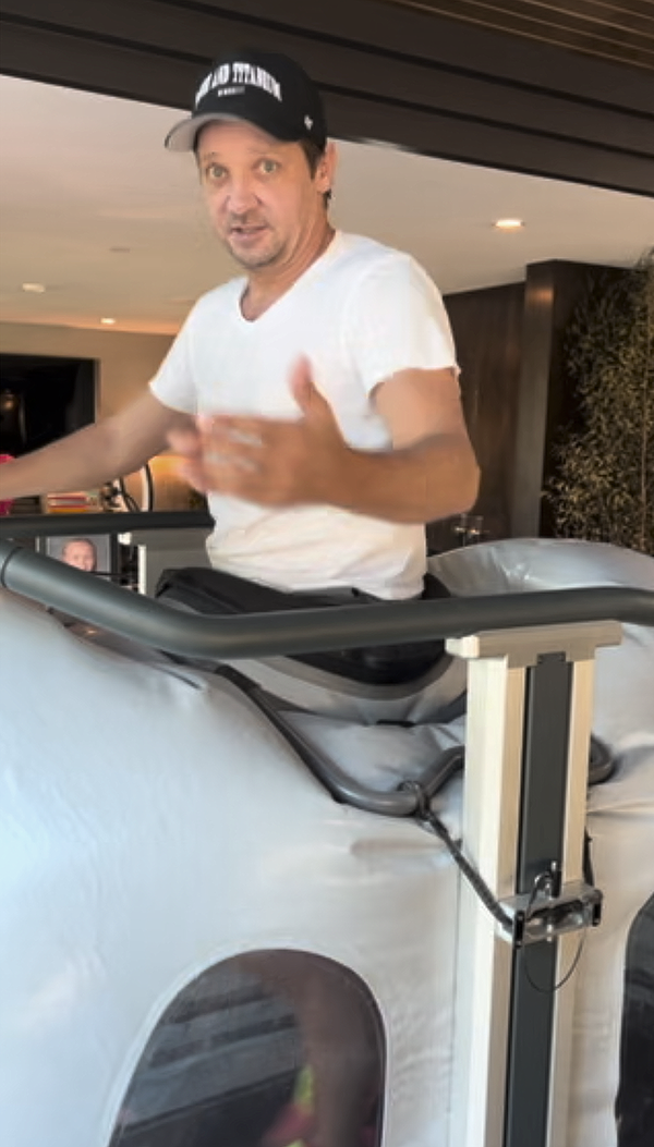 Actor Jeremy Renner works out on a Boost 2 treadmill