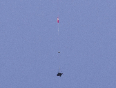 A robotic climber returns to the ground after a challenge