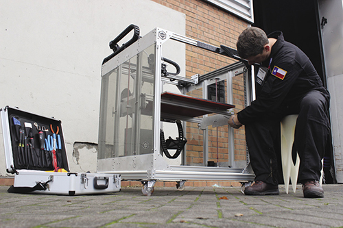 Technician working on 3D printer