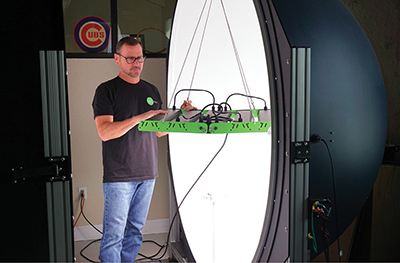 BiOS Lighting vice president Neil Yorio works on Icarus LED grow lights