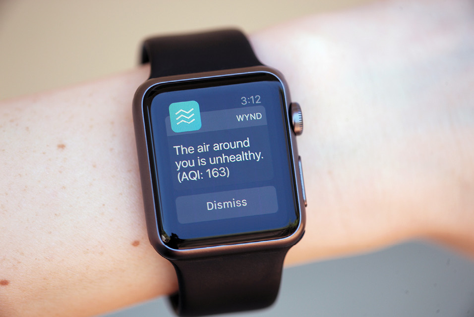 A smart watch displays the Wynd app