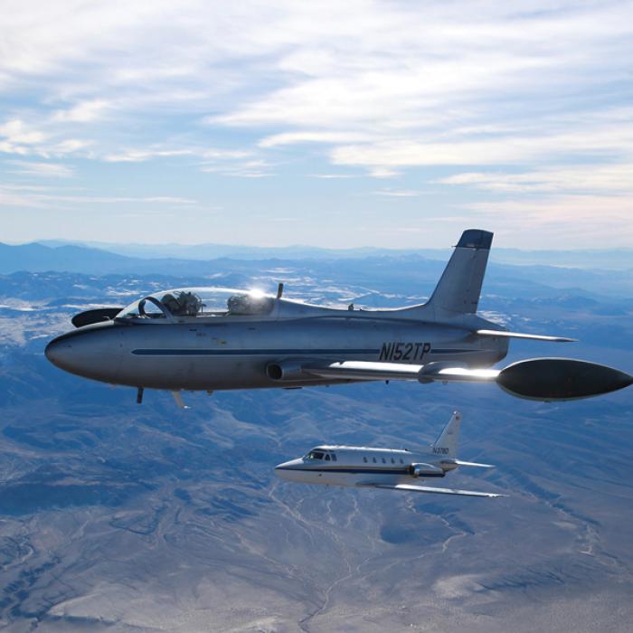 Two planes flying over Mojave Desert