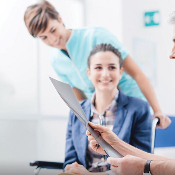 Doctor and nurse with patient