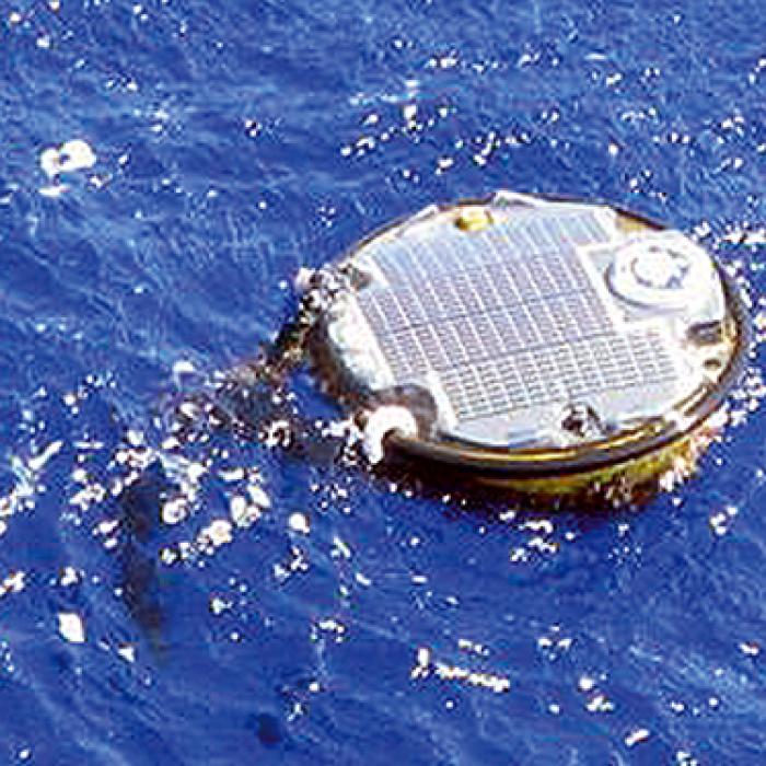 An Airborne Technologies buoy floats on the ocean’s surface