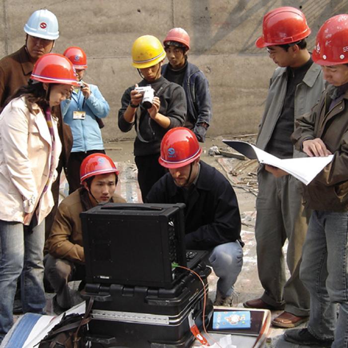 Engineers use Sensor Tran system to collect temperature data for a dam project