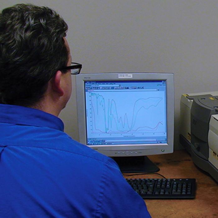 The Spectrafire emissometer displays its results on a monitor.