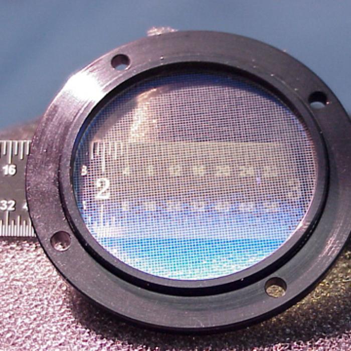 An advanced thin foil filter with a ruler behind it