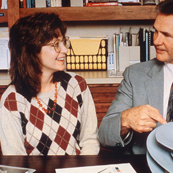 Leonard Hill of North American Marine Jet and Dinah Higgins of Marshall Space Flight Center display an impeller blade made by advanced rapid prototyping techniques