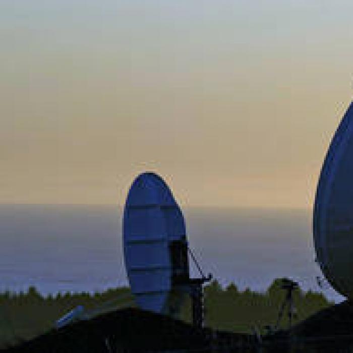 Two telecommunications satellites