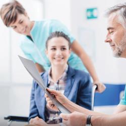 Doctor and nurse with patient