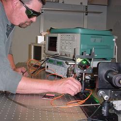 An engineer works with a machine that measures air data