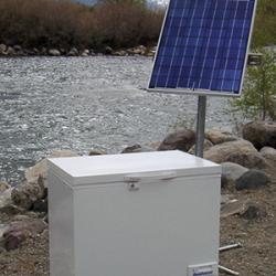 SunDanzer solar-powered refrigerator outside in cloudy weather