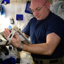 NASA astronaut Scott Kelly using an Apple iPad