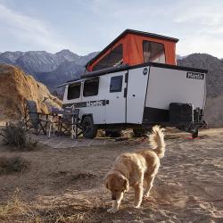 The largest of Taxa’s campers, the Mantis, with a dog in the foreground