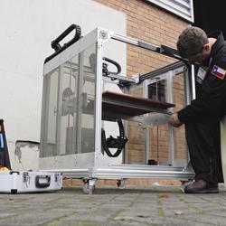 Technician working on 3D printer